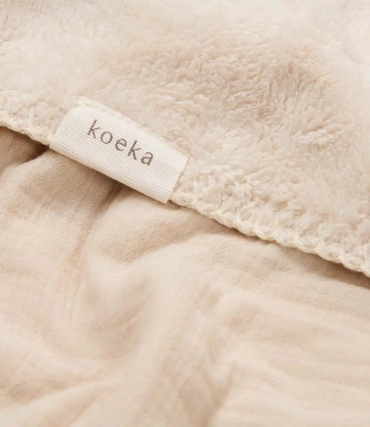 Wiegdeken teddy Faro // warm white Koeka